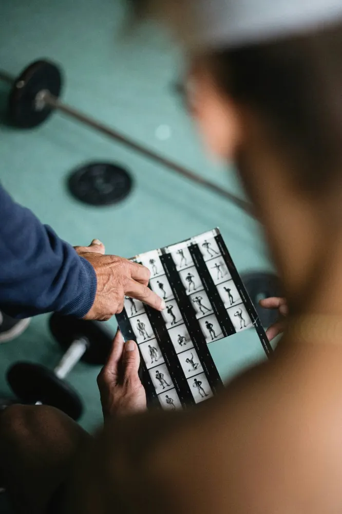 Trainer coaching a member